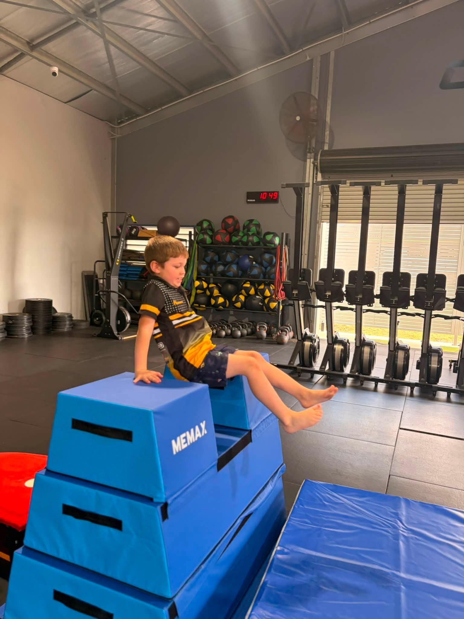 Boy on parkour blocks